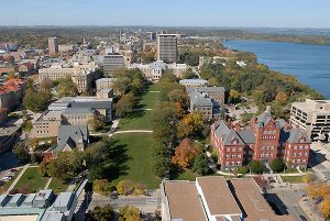 An aerial view from a helicopter highlights the central portion of the UW-Madison campus including the historic Bascom Hill area during a sunny autumn day on Oct. 7, 2006. Clockwise from lower left is Music Hall, the Law Building, South Hall, Bascom Hall, North Hall, the Education Building and Science Hall. In the background is Picnic Point and the Lake Mendota shoreline. ©UW-Madison University Communications 608/262-0067 Photo by: Jeff Miller Date: 10/06    File#:   D200 digital camera frame 1178